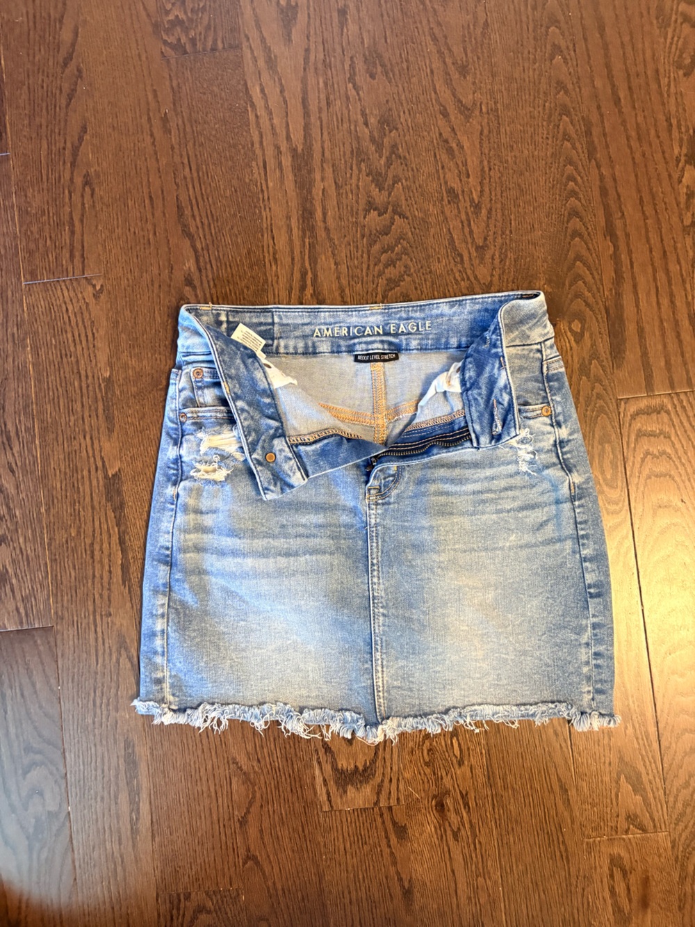 American Eagle Outfitters Light Wash Distressed Denim Mini Skirt